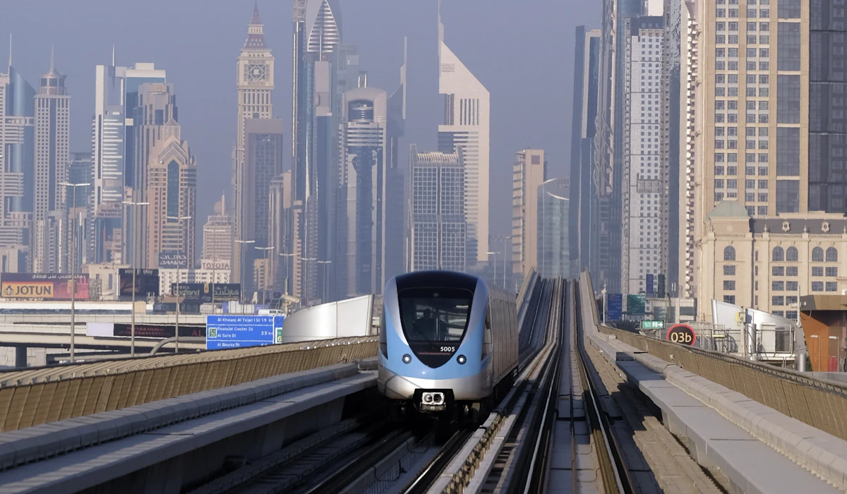 Dubai Metro train passing the city skyline